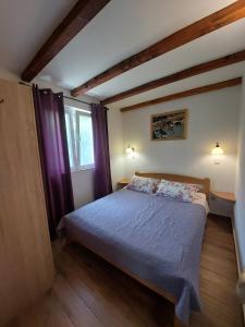 Postel nebo postele na pokoji v ubytování Garden apartmant near sea