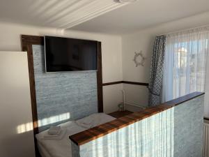 TV a/nebo společenská místnost v ubytování Hotel Schöne Aussicht