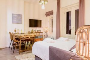 TV a/nebo společenská místnost v ubytování Hotel Oranjestaete + 37 fotografií