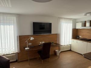 Kuchyň nebo kuchyňský kout v ubytování Hotel Schöne Aussicht
