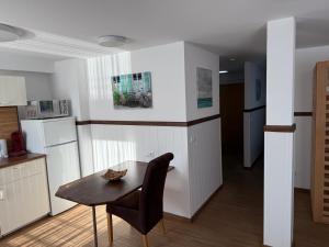 Kuchyň nebo kuchyňský kout v ubytování Hotel Schöne Aussicht