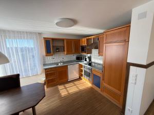 Kuchyň nebo kuchyňský kout v ubytování Hotel Schöne Aussicht