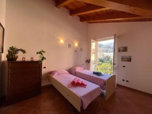 Postel nebo postele na pokoji v ubytování Dream Balcony on Lake Como