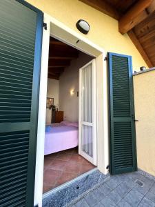 Postel nebo postele na pokoji v ubytování Dream Balcony on Lake Como