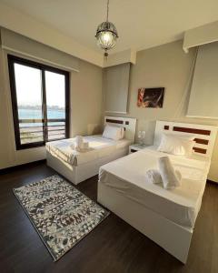 Postel nebo postele na pokoji v ubytování Luxury villa in gouna