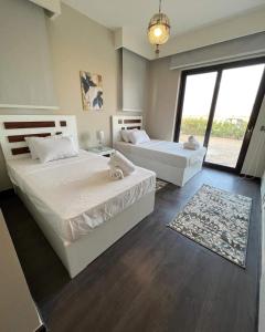 Postel nebo postele na pokoji v ubytování Luxury villa in gouna