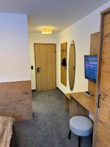 Telewizja i/lub zestaw kina domowego w obiekcie Chalet Lenzi