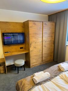 Łóżko lub łóżka w pokoju w obiekcie Chalet Lenzi