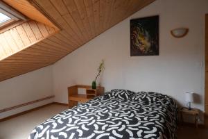 Postel nebo postele na pokoji v ubytování Le Grand Nid - Gîte La Maison Alvéole