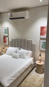 Postel nebo postele na pokoji v ubytování Sifah seaCottage + 37 fotografií
