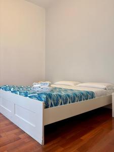 A bed or beds in a room at Castelnuovo Rooms #Politeama