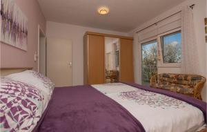 Postel nebo postele na pokoji v ubytování Three-Bedroom Apartment In Podaca