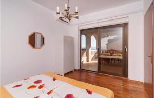 Posteľ alebo postele v izbe v ubytovaní Two-Bedroom Apartment In Bol