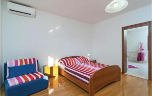 Posteľ alebo postele v izbe v ubytovaní Two-Bedroom Apartment In Bol