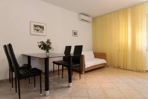 Posedenie v ubytovaní Eco-Apartments with nice garden + 21 fotografií