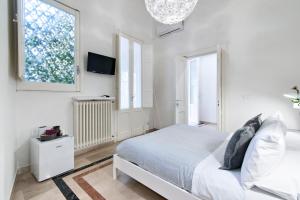 Telewizja i/lub zestaw kina domowego w obiekcie InCentro Comfort Suite - Lecce Selection