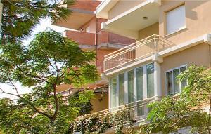 a building with balconies on the side of it at Trilo in Cattolica