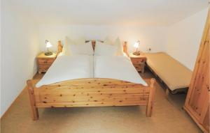 Ein Bett oder Betten in einem Zimmer der Unterkunft Ferienhaus - Westendorf