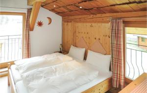 Ein Bett oder Betten in einem Zimmer der Unterkunft Ferienhaus - Westendorf