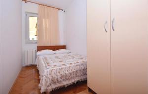Posteľ alebo postele v izbe v ubytovaní Apartment Omis Lxxvi