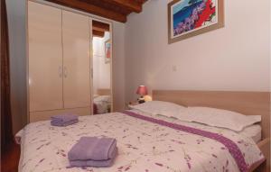 Posteľ alebo postele v izbe v ubytovaní Two-Bedroom Holiday Home In Orebic