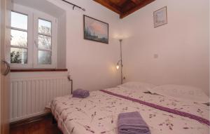 Posteľ alebo postele v izbe v ubytovaní Two-Bedroom Holiday Home In Orebic