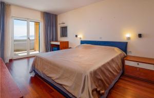 Posteľ alebo postele v izbe v ubytovaní Amazing Apartment In Moscenicka Draga