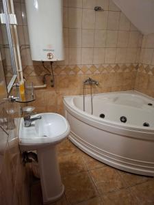 Koupelna v ubytování Hotel Koliba na Grza