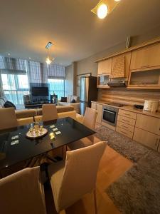 Kuchyň nebo kuchyňský kout v ubytování Apartment Liqeni