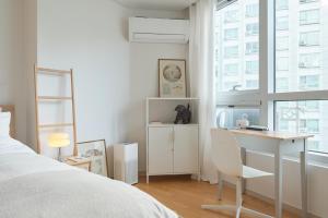 Postel nebo postele na pokoji v ubytování Urban Studio + 37 fotografií