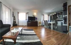Televízia a/alebo spoločenská miestnosť v ubytovaní Apartment Varos Bb