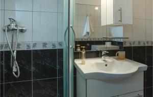Kúpeľňa v ubytovaní Apartment Varos Bb
