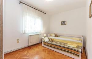 Posteľ alebo postele v izbe v ubytovaní Amazing Apartment In Rijeka With Wifi