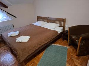 Postel nebo postele na pokoji v ubytování Hotel Koliba na Grza