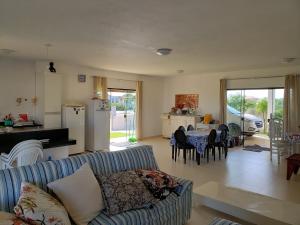Posezení v ubytování Casa Veraneio Proximo ao Mar e a Lagoa