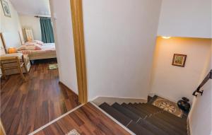 a hallway with a stairway leading to a bedroom at Holiday Home Vizinada X in Vižinada