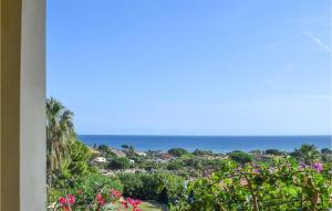 a view of the ocean from the balcony of a house at Vespucci in Costa Rei