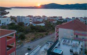 an aerial view of a city with the water and buildings at Gorgeous Apartment In Okrug Gornji in Trogir +25 photos