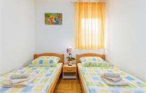Posteľ alebo postele v izbe v ubytovaní Lovely Apartment In Fazana With Kitchen