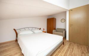 Posteľ alebo postele v izbe v ubytovaní Apartment Vojskovo Iii