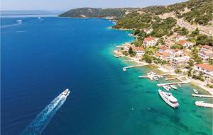 a group of boats in a large body of water at Pet Friendly Home In Supertarska Draga in Supetarska Draga +45 photos