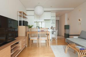 TV a/nebo společenská místnost v ubytování Urban Studio