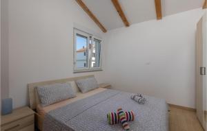 Posteľ alebo postele v izbe v ubytovaní 2 Bedroom Amazing Apartment In Njivice