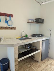 Kuchyň nebo kuchyňský kout v ubytování Primera línea de playa
