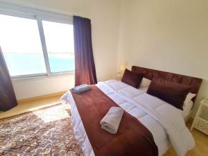 Postel nebo postele na pokoji v ubytování White villa