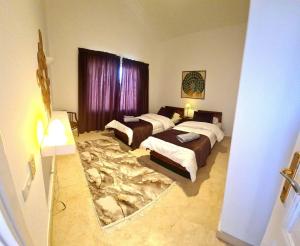 Postel nebo postele na pokoji v ubytování White villa + 28 fotografií