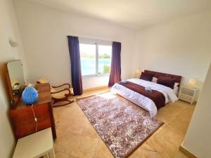 Postel nebo postele na pokoji v ubytování White villa