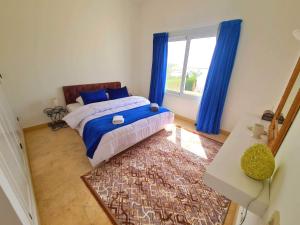 Postel nebo postele na pokoji v ubytování White villa