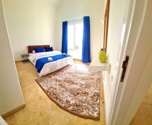 Postel nebo postele na pokoji v ubytování White villa
