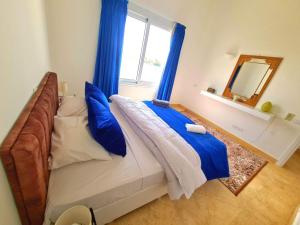Postel nebo postele na pokoji v ubytování White villa